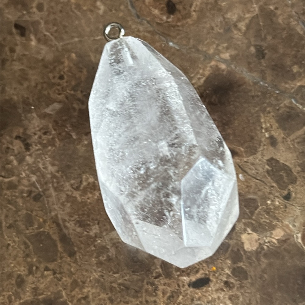 Large cut crystal pendant there is a ghost inside this quartz crystal encased